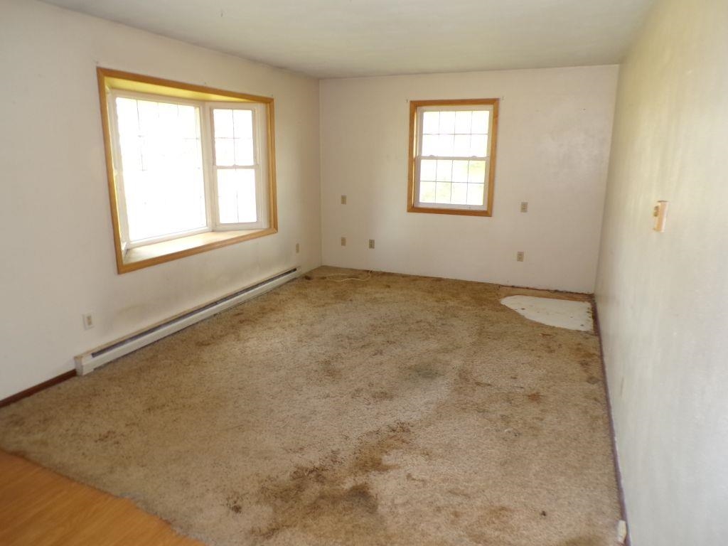 5779 Town Line Road Leaf River, IL 61047 - Photo 3 of 14 an empty room with a window