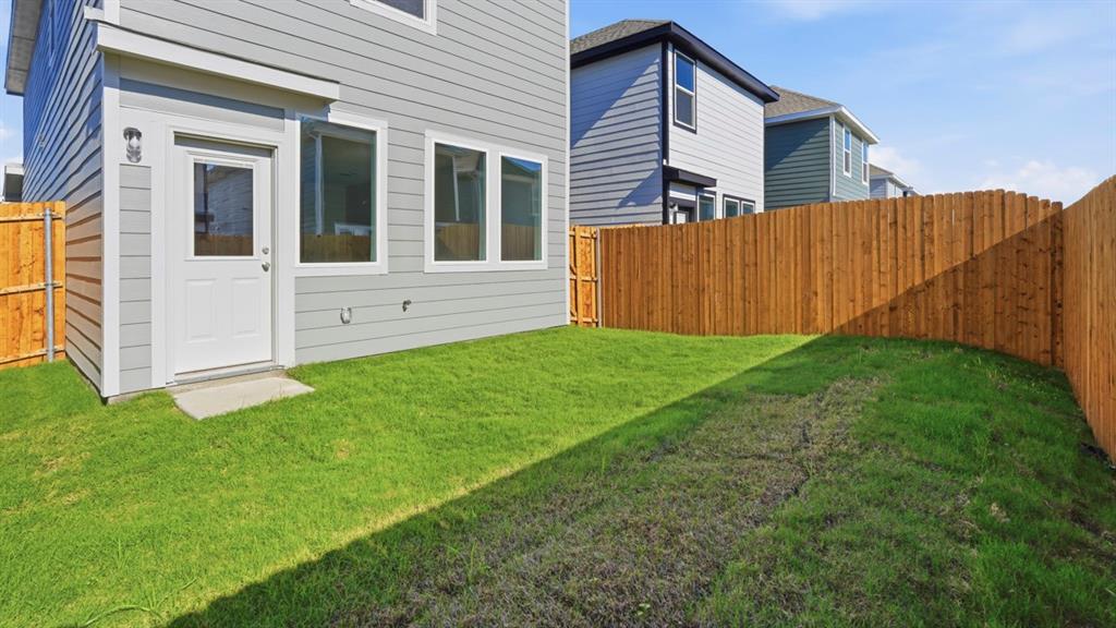 321 Tall Cedar Way Princeton, TX 75407 - Photo 3 of 8 a view of a house with backyard
