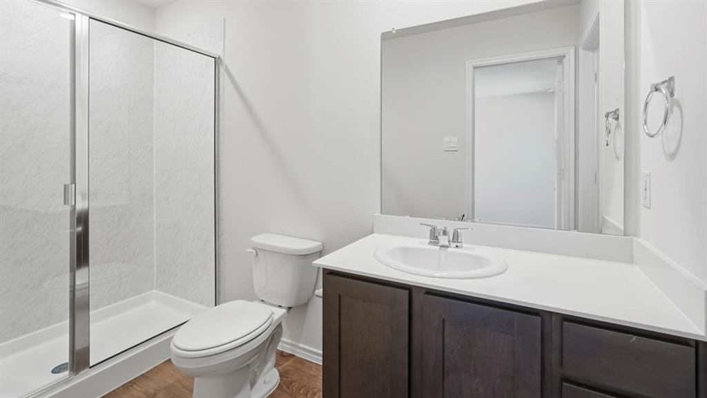 321 Tall Cedar Way Princeton, TX 75407 - Photo 8 of 8 a bathroom with a sink and a mirror