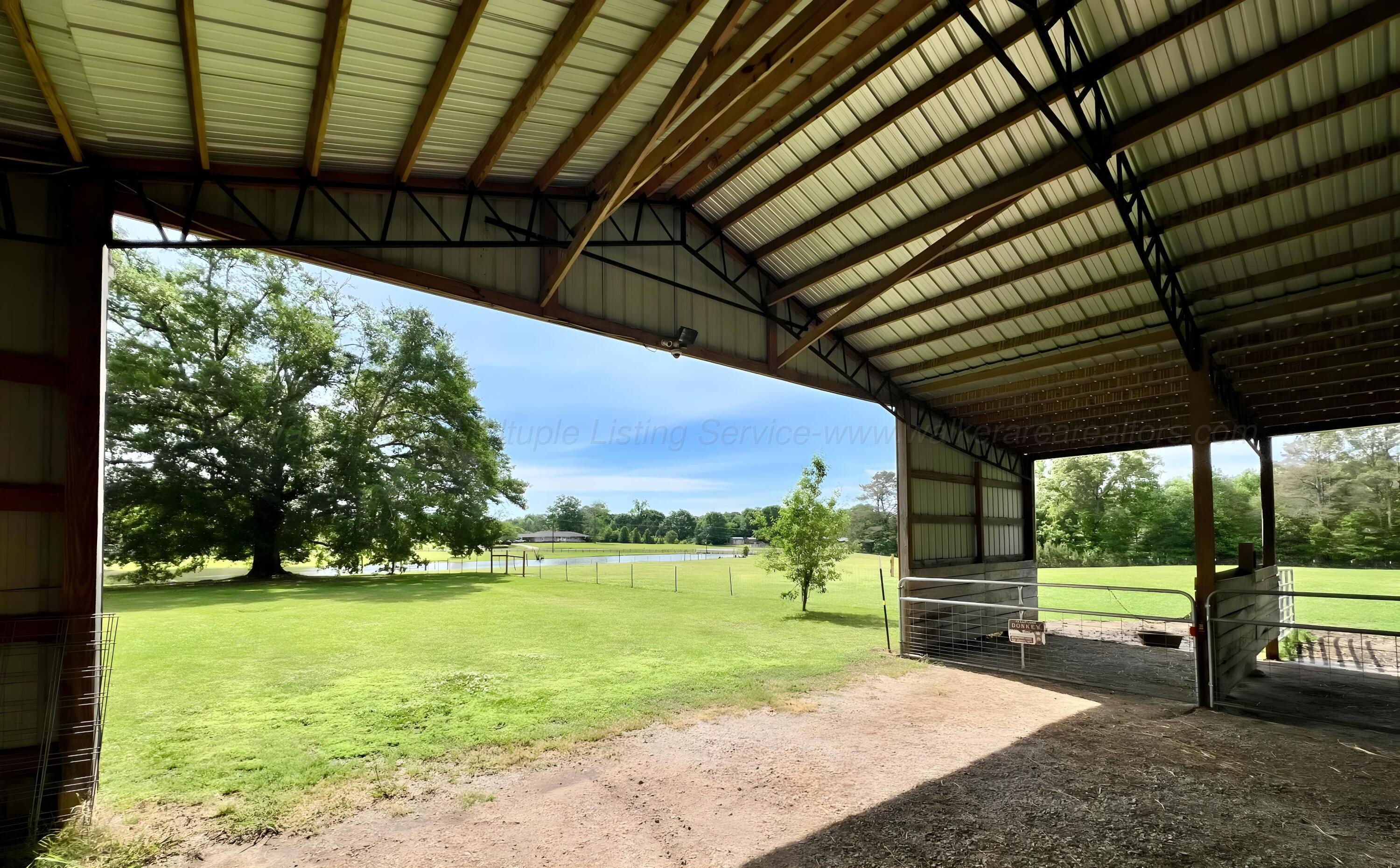 1751 North Walston Bridge Road Jasper, AL 35504 - Photo 21 of 52 Large barn looking out onto the beautiful acreage.