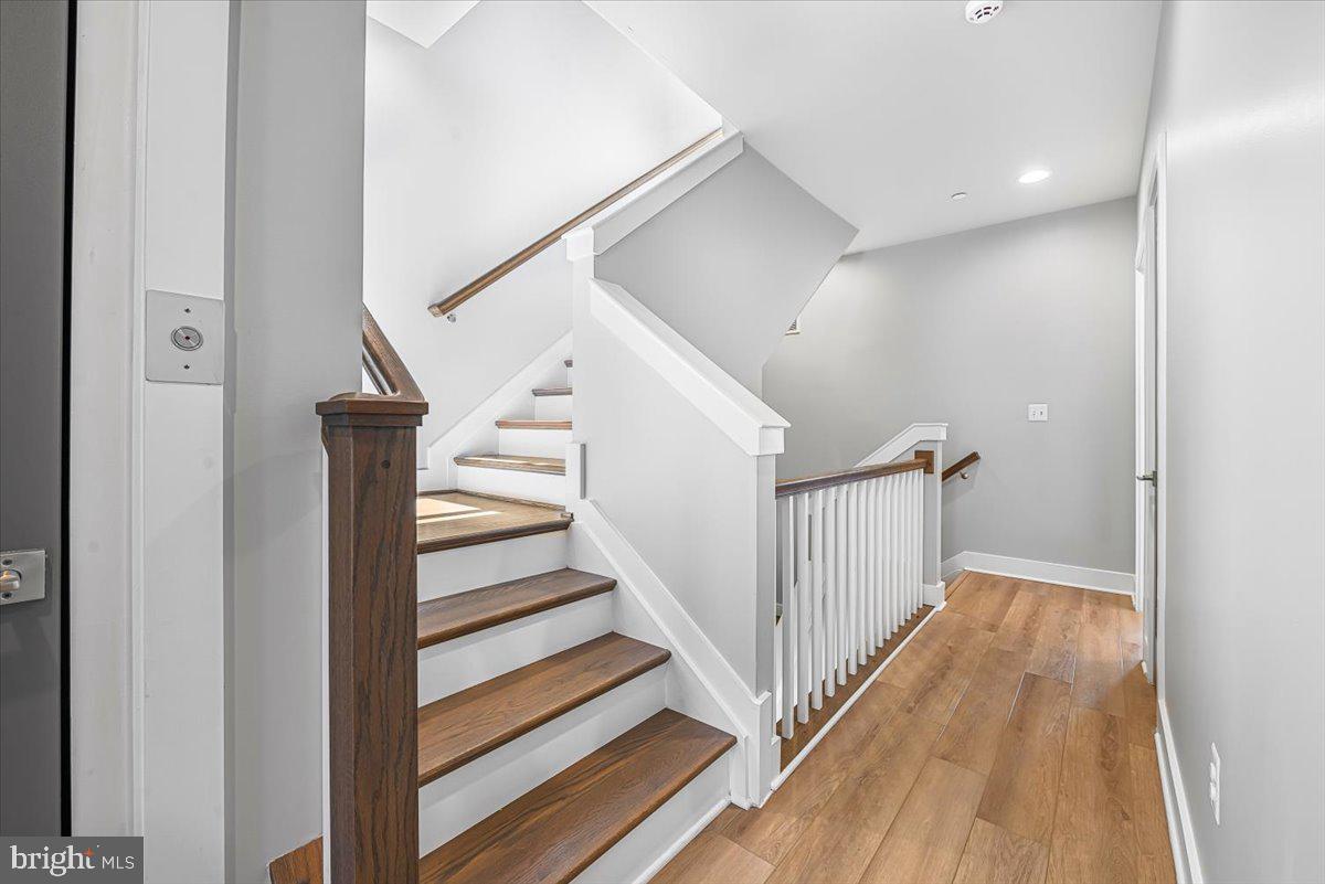8197 River Road Bethesda, MD 20817 - Photo 30 of 53 a view of a hallway with wooden floor and entryway
