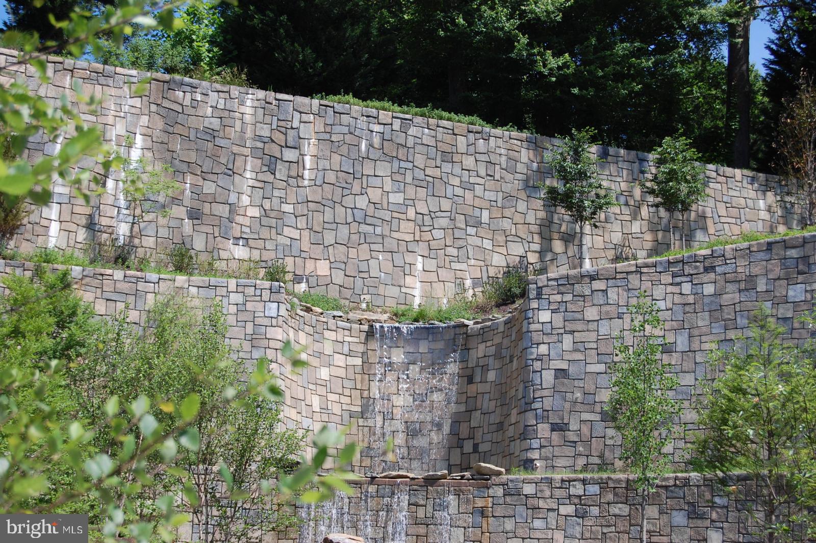 8197 River Road Bethesda, MD 20817 - Photo 43 of 53 The Quarry waterfall leads to a stream