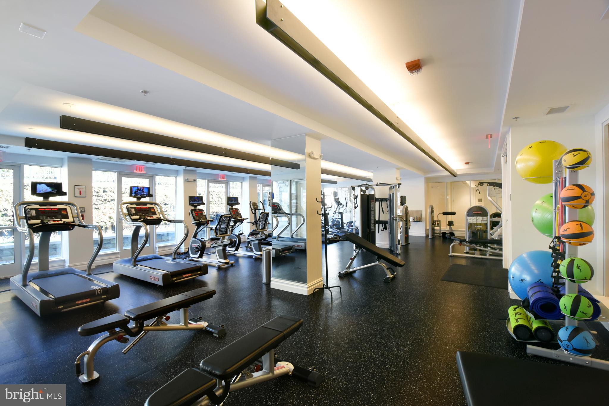 8197 River Road Bethesda, MD 20817 - Photo 47 of 53 a view of a room with gym equipment