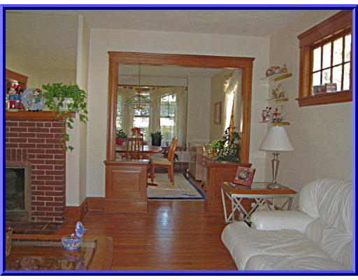 31 Lovell Road Watertown, MA 02472 - Photo 2 of 11 a living room with furniture and a potted plant