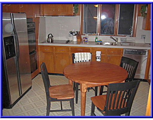 31 Lovell Road Watertown, MA 02472 - Photo 4 of 11 a view of a dining room with furniture