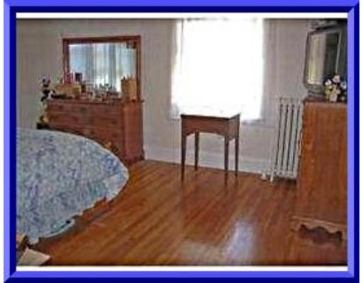 31 Lovell Road Watertown, MA 02472 - Photo 8 of 11 a view of a room with wooden floor and furniture