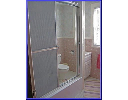 31 Lovell Road Watertown, MA 02472 - Photo 10 of 11 a bathroom with a granite countertop shower