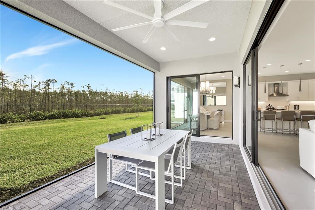 21023 Teak Tree Terrace Estero, FL 33928 - Photo 11 of 21 a outdoor space with furniture and garden view