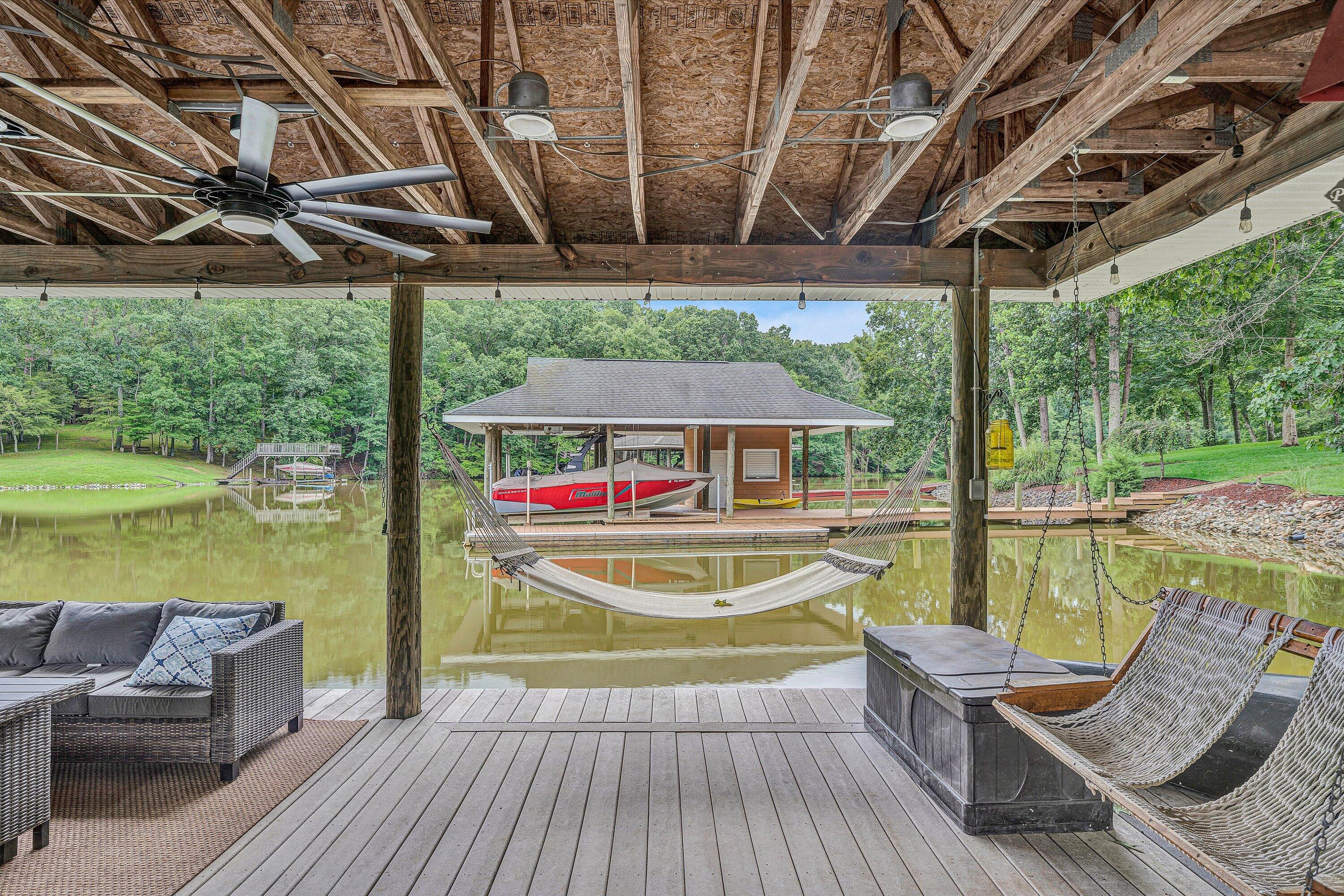 239 Cedar Bay Road Union Hall, VA 24176 - Photo 40 of 51 a view of swimming pool with a couches chairs and a yard