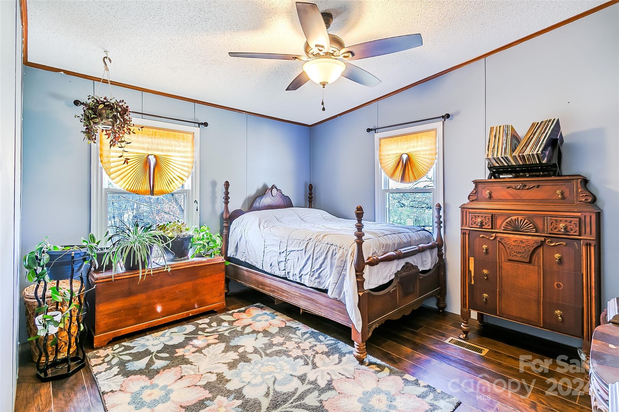 687 Newfound Road Leicester, NC 28748 - Photo 18 of 43 a bedroom with a bed and a couch