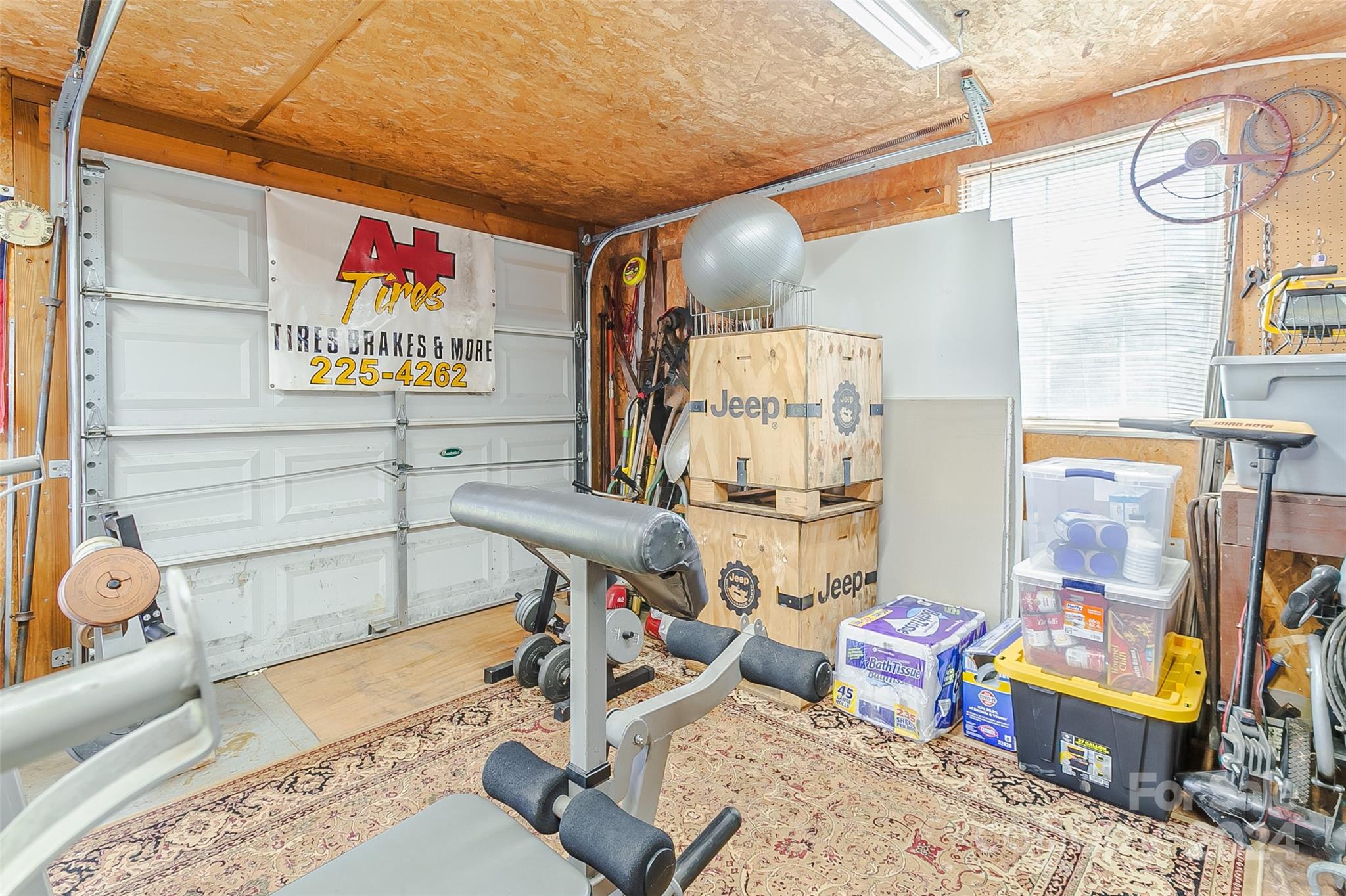 687 Newfound Road Leicester, NC 28748 - Photo 31 of 43 a living room with furniture and a rug