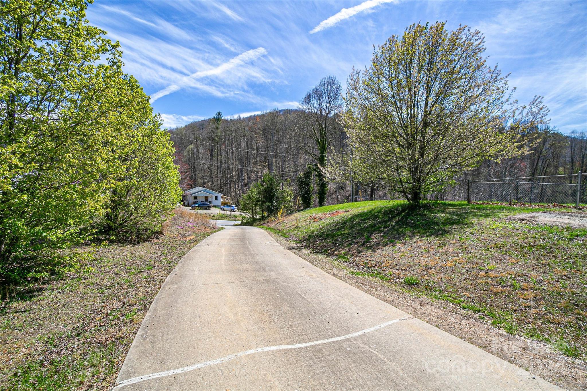 687 Newfound Road Leicester, NC 28748 - Photo 38 of 43 a view of a backyard with green space