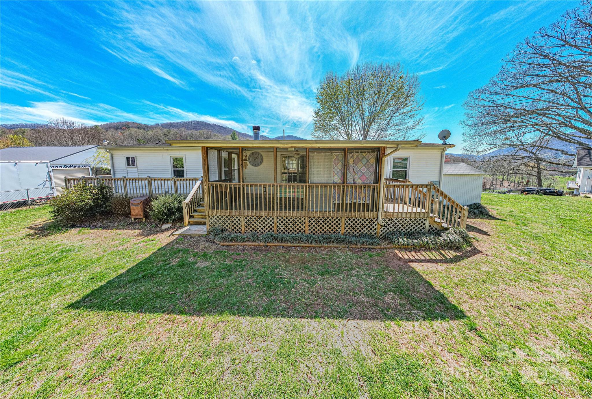 687 Newfound Road Leicester, NC 28748 - Photo 4 of 43 a view of a house with backyard