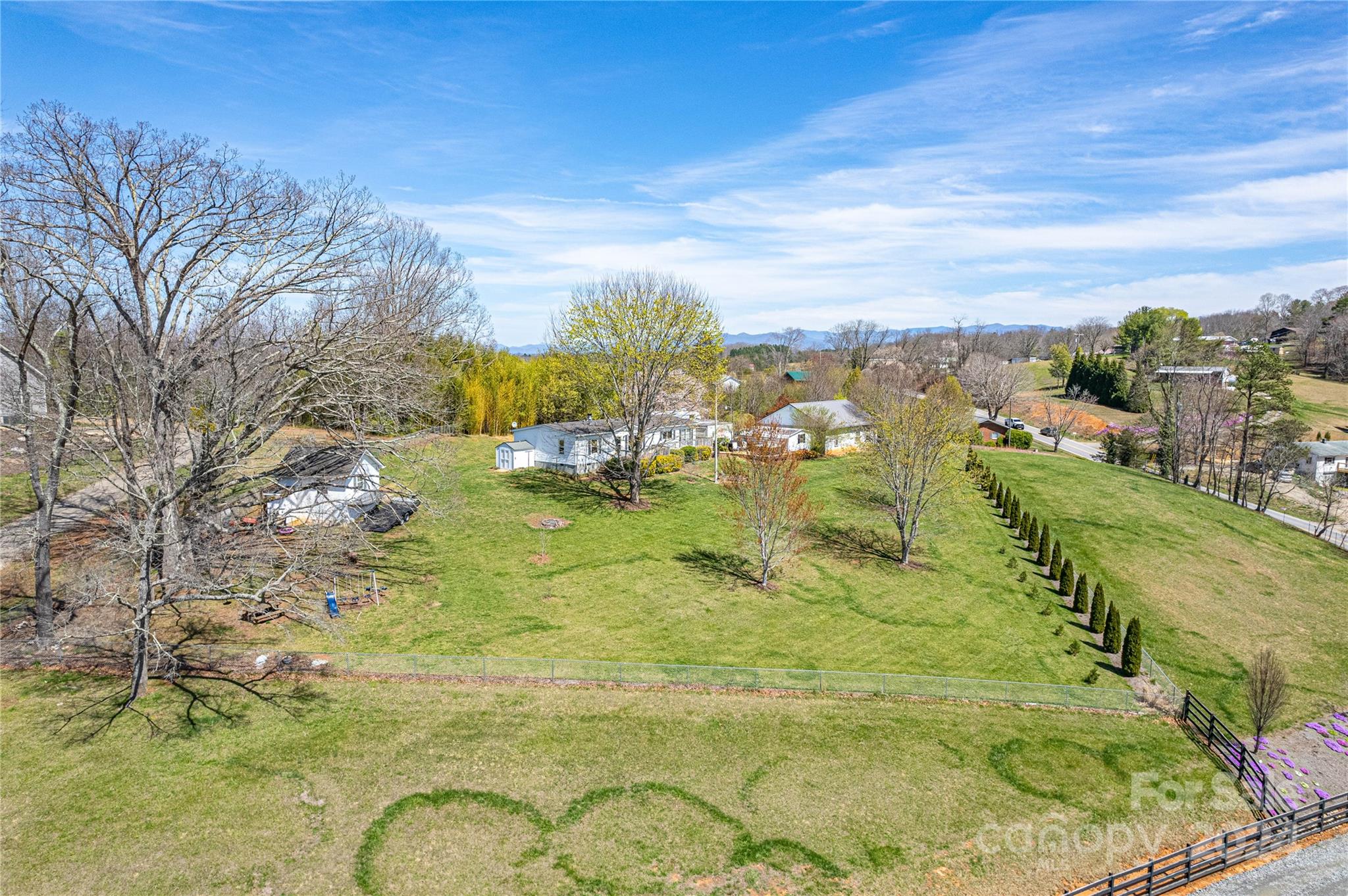687 Newfound Road Leicester, NC 28748 - Photo 41 of 43 a view of a lake with houses