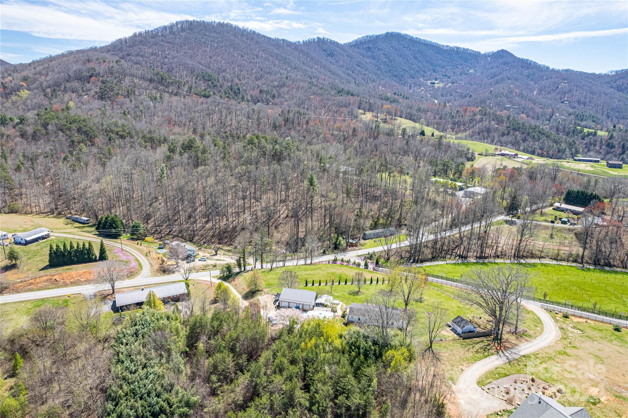 687 Newfound Road Leicester, NC 28748 - Photo 42 of 43 a view of a swimming pool with a yard