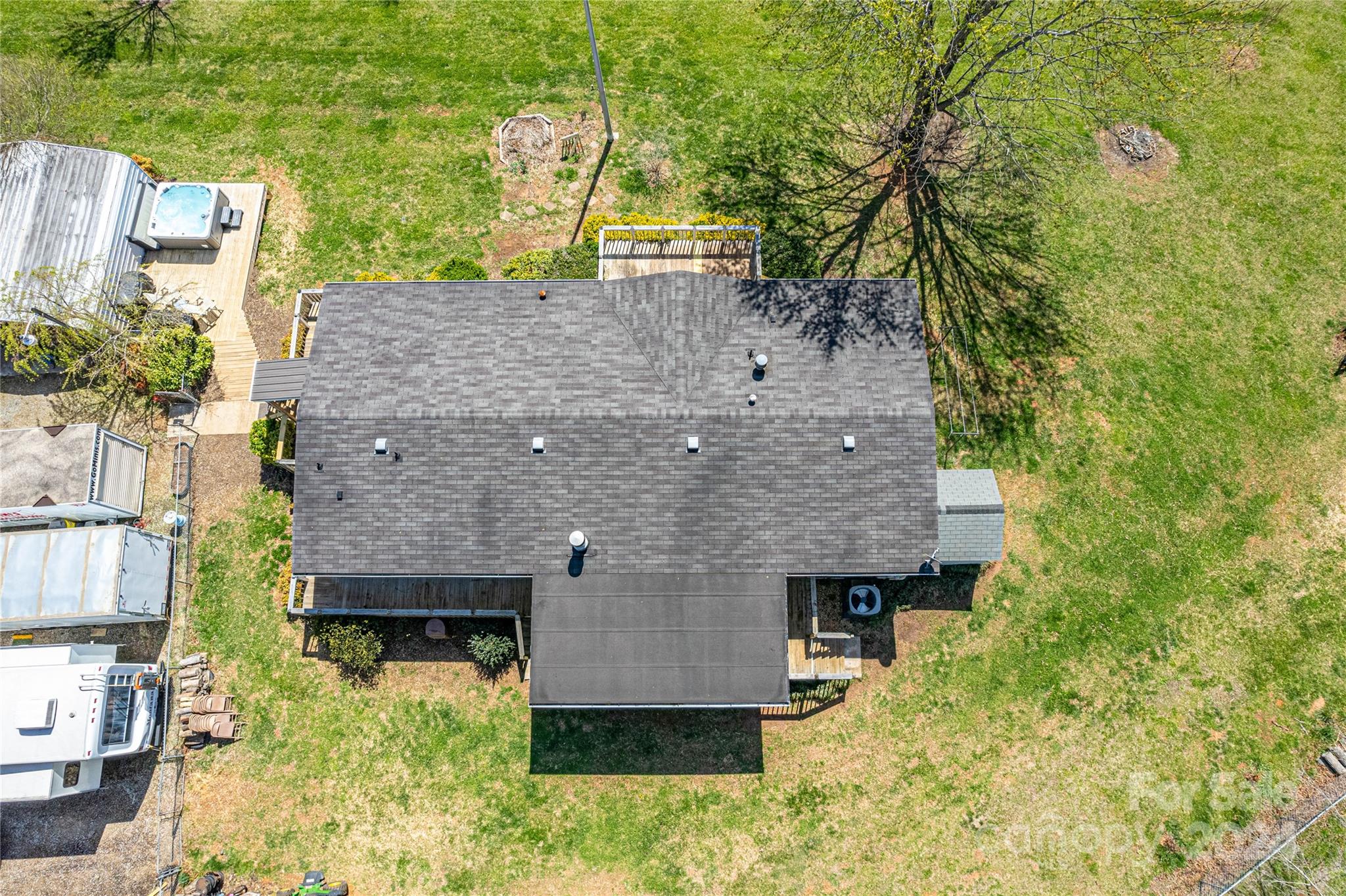 687 Newfound Road Leicester, NC 28748 - Photo 43 of 43 an aerial view of a house with a yard basket ball court and outdoor seating