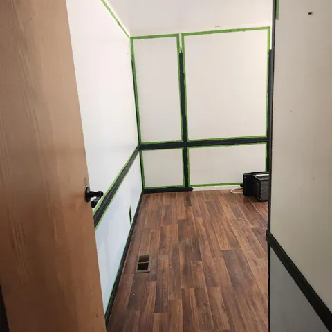 a view of entryway with wooden floor