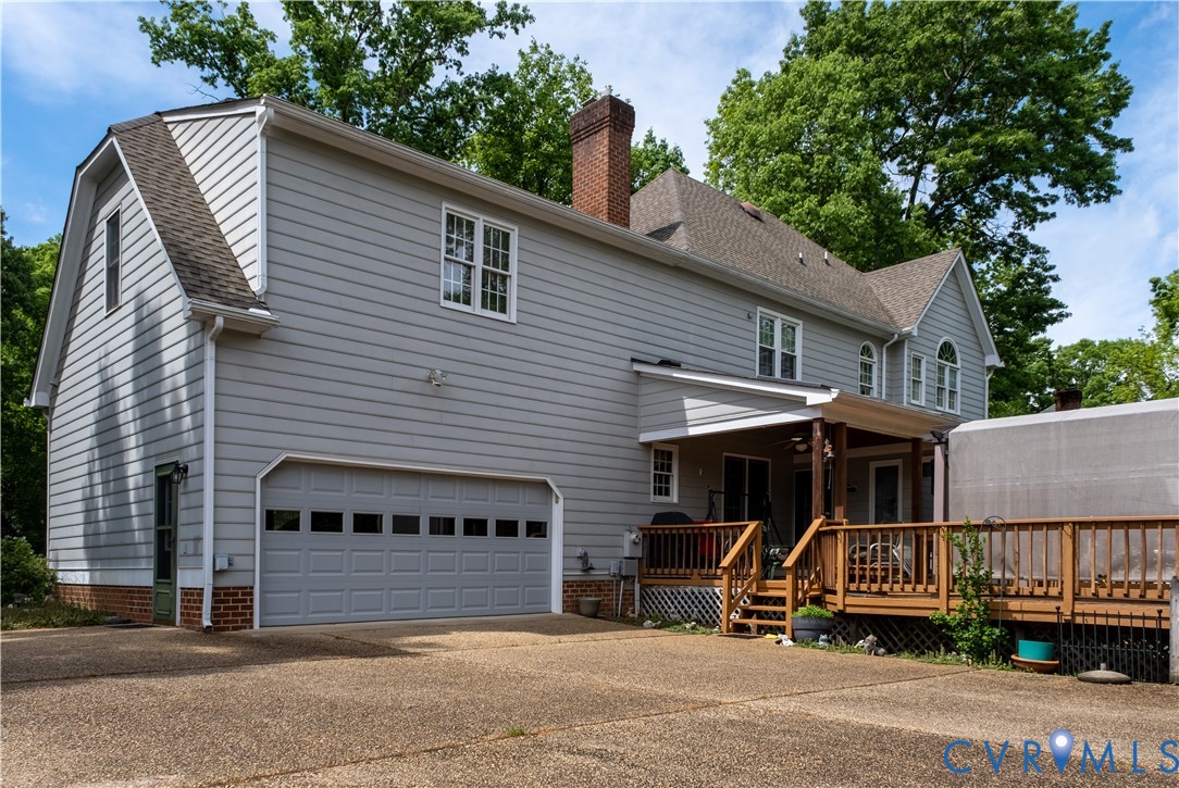 2301 Chartstone Drive Midlothian, VA 23113 - Photo 2 of 18 a view of a car park in front of house