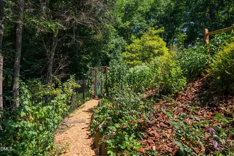 $975,000 | 212 Middlegreen Place, Holly Springs, NC 27540