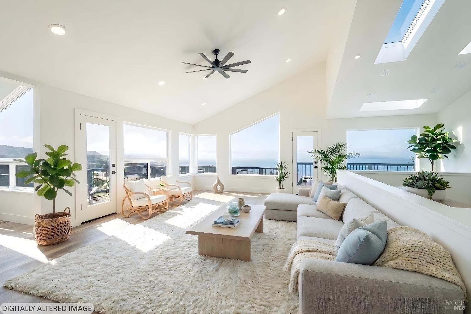 32 Kailua Way Dillon Beach, CA 94929 - Photo 1 of 19 a living room with furniture and a large window