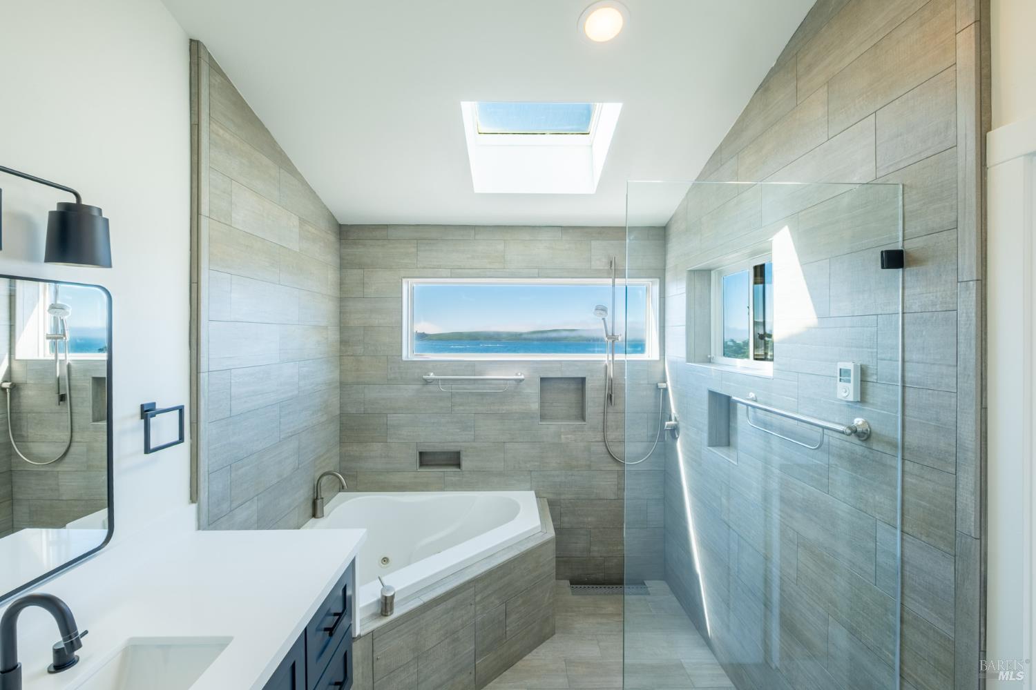 32 Kailua Way Dillon Beach, CA 94929 - Photo 12 of 19 a bathroom with a sink a toilet and shower