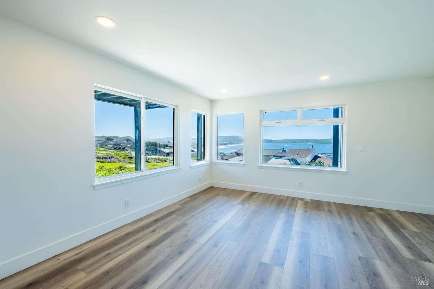 32 Kailua Way Dillon Beach, CA 94929 - Photo 17 of 19 wooden floor in an empty room with a window