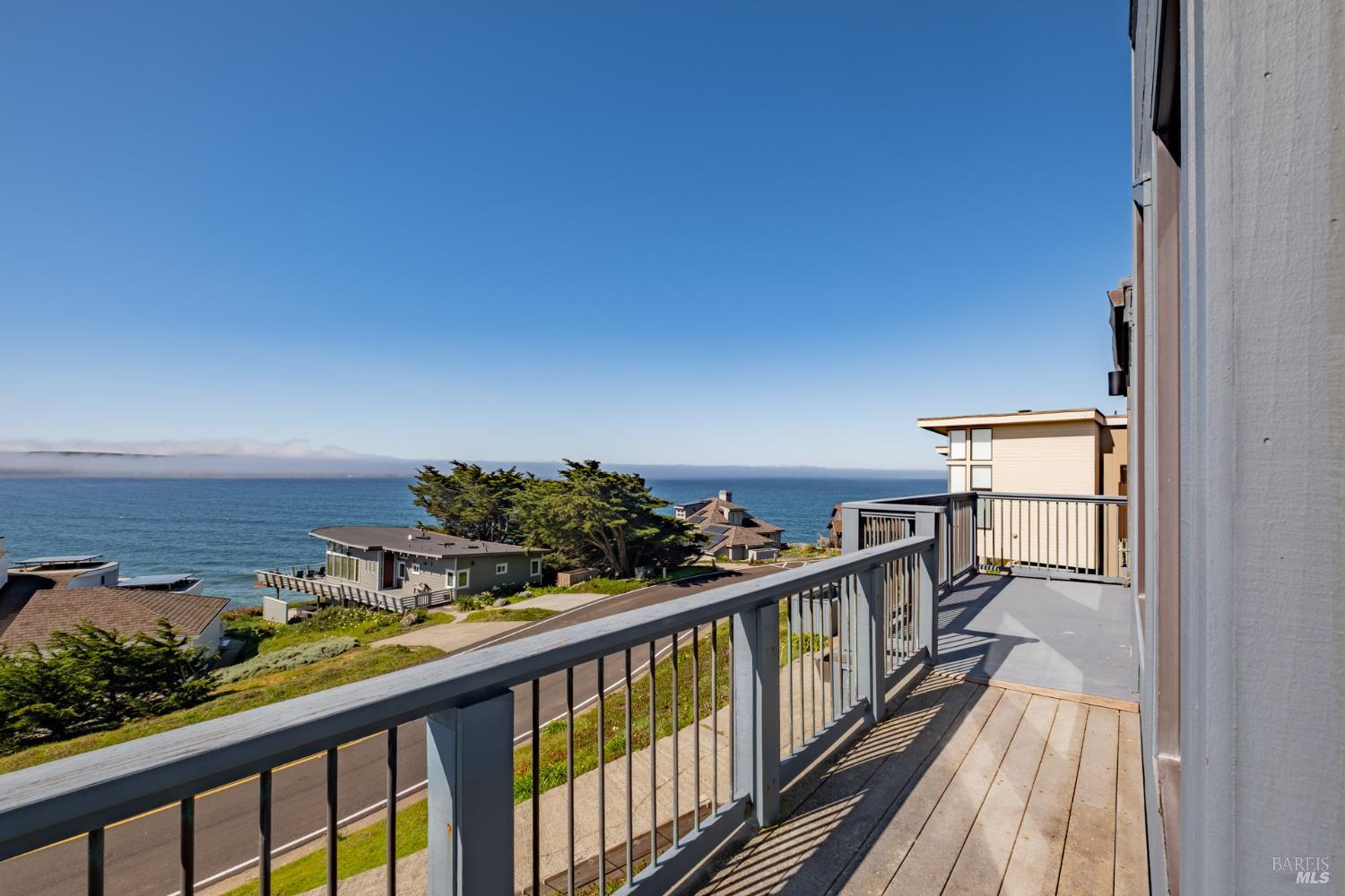 32 Kailua Way Dillon Beach, CA 94929 - Photo 19 of 19 a view of a balcony with wooden floor