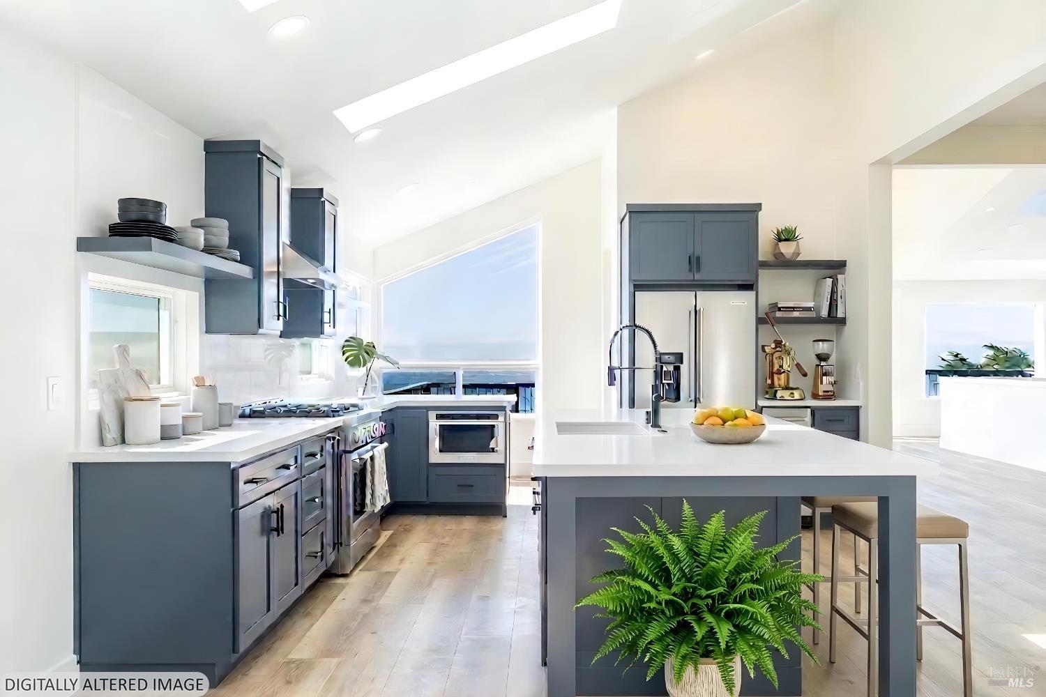 32 Kailua Way Dillon Beach, CA 94929 - Photo 5 of 19 a kitchen with a stove a sink and a refrigerator
