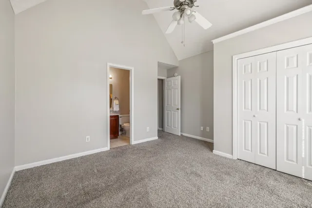 a bathroom with a sink vanity and tub