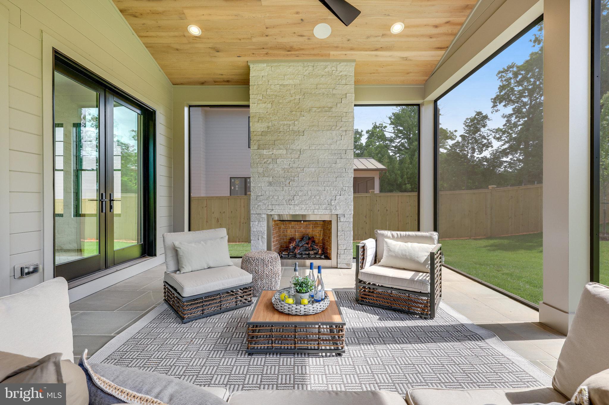 1111 Ingleside Avenue McLean, VA 22101 - Photo 29 of 99 Screened Patio with Fireplace and Space Heaters