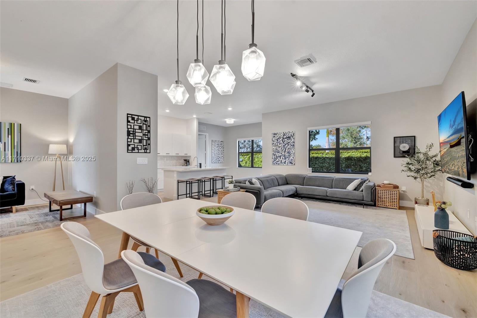 17473 Southwest 41st Street Miramar, FL 33029 - Photo 12 of 92 Open concept and bright dining / family room w/ upgraded fixtures and volume ceilings.