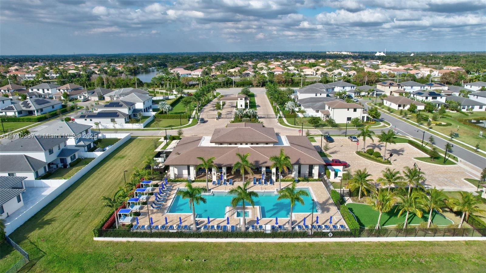 17473 Southwest 41st Street Miramar, FL 33029 - Photo 88 of 92 Brand New Luxury Clubhouse w/ Heated Lake Side Lap Pool with umbrellas and lounge chairs, Putting Green, Gym, Kitchen, Child Play Area and Party Spaces