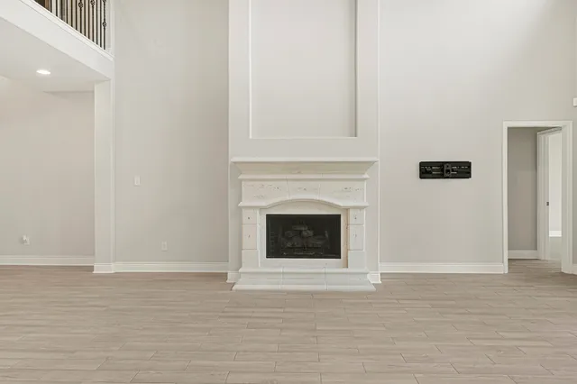 a kitchen with kitchen island granite countertop a sink a center island stainless steel appliances and cabinets