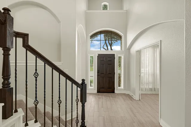 a view of front door with stairs