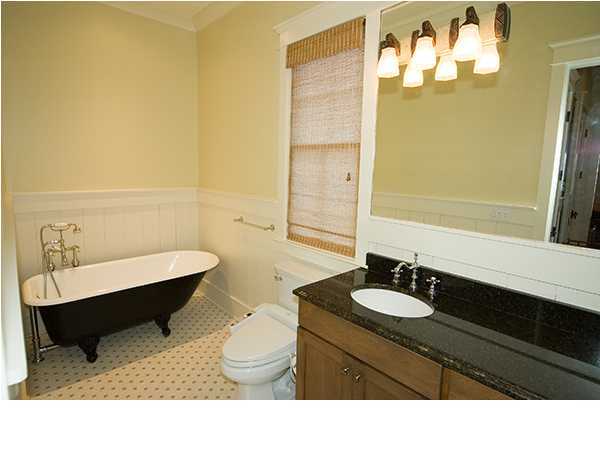 282 Blue Mountain Road Santa Rosa Beach, FL 32459 - Photo 11 of 16 a bathroom with a sink and a mirror