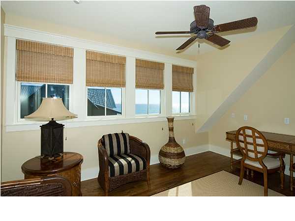 282 Blue Mountain Road Santa Rosa Beach, FL 32459 - Photo 16 of 16 a living room with furniture and a window