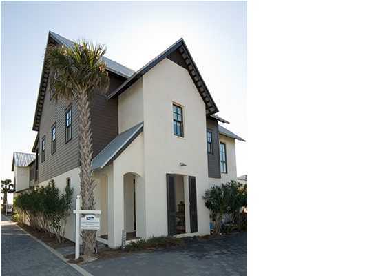 282 Blue Mountain Road Santa Rosa Beach, FL 32459 - Photo 2 of 16 a front view of a house with garage