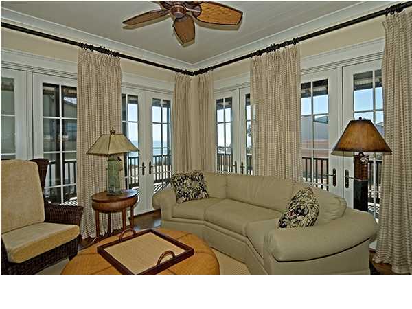 282 Blue Mountain Road Santa Rosa Beach, FL 32459 - Photo 3 of 16 a living room with furniture and a potted plant