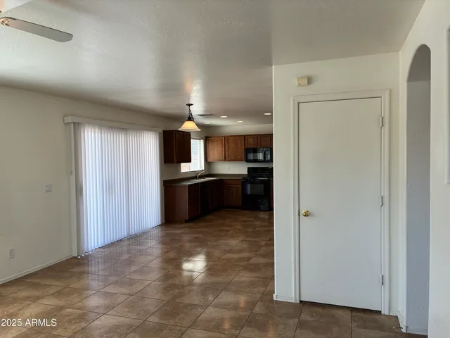 a view of a kitchen with a sink
