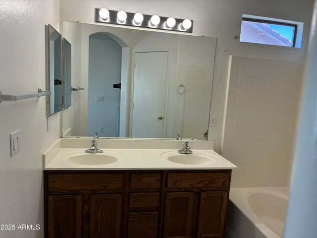 a bathroom with a bathtub