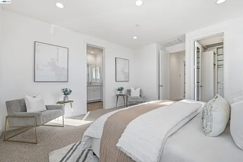 a living room with furniture or couch and a wooden floor