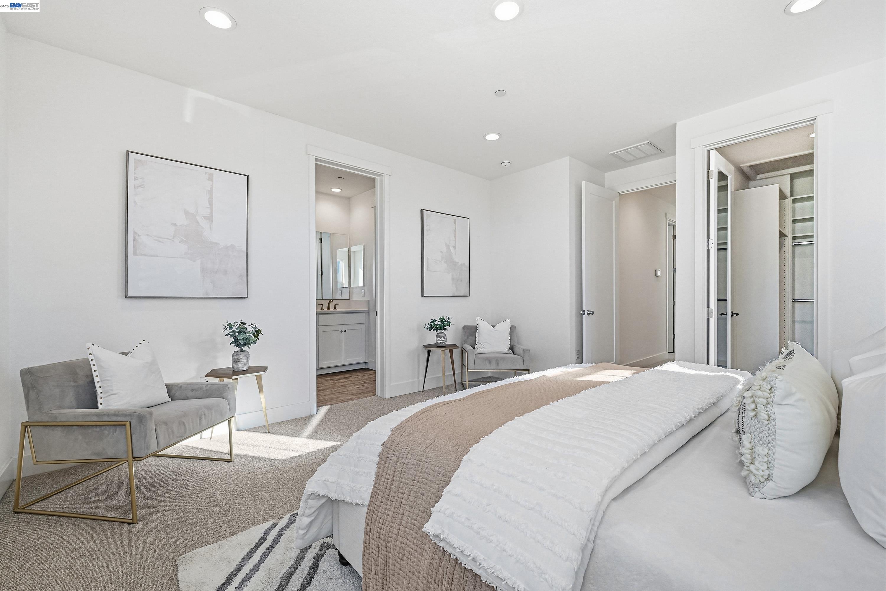 37541 Bay Crest Road Newark, CA 94560 - Photo 20 of 50 a bedroom with a bed and a chair