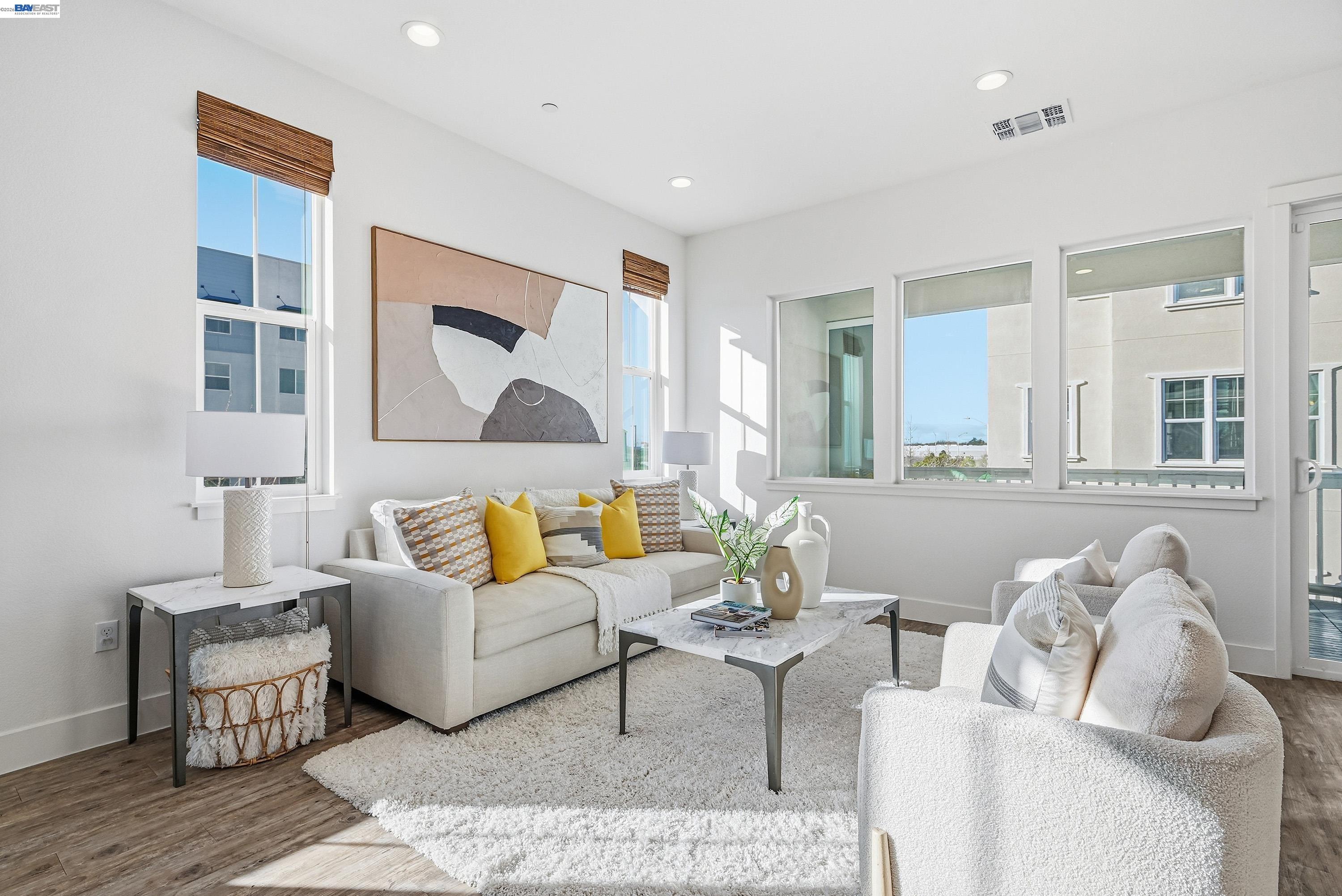 37541 Bay Crest Road Newark, CA 94560 - Photo 2 of 50 a living room with furniture and a painting on the wall