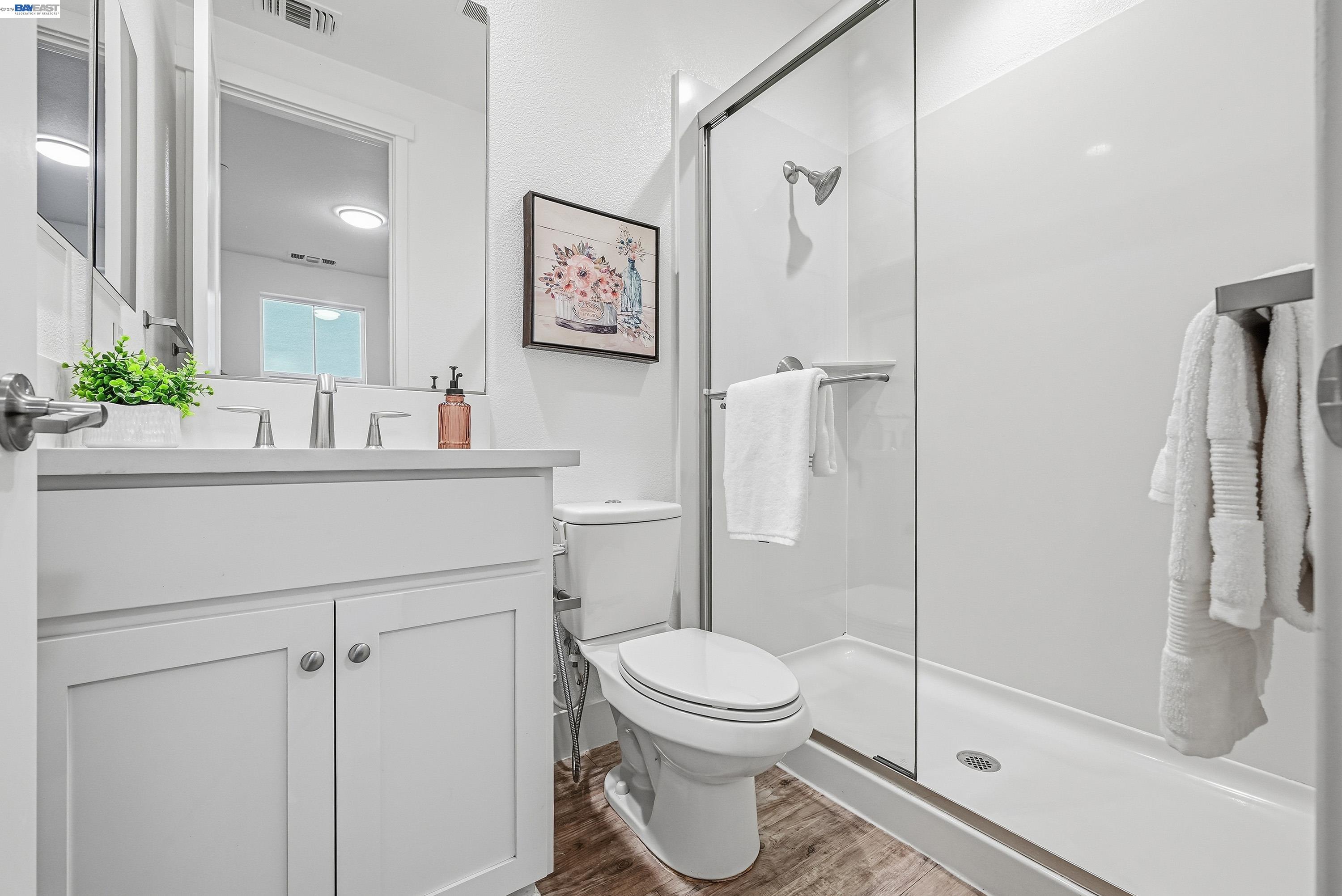 37541 Bay Crest Road Newark, CA 94560 - Photo 28 of 50 a bathroom with a sink a toilet and shower