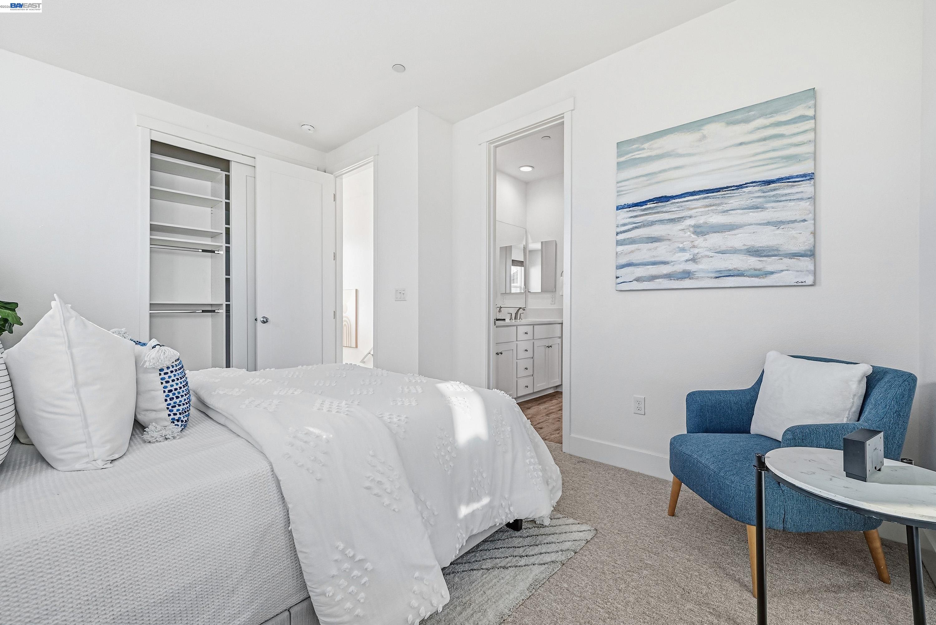 37541 Bay Crest Road Newark, CA 94560 - Photo 31 of 50 a bedroom with a bed and a chair