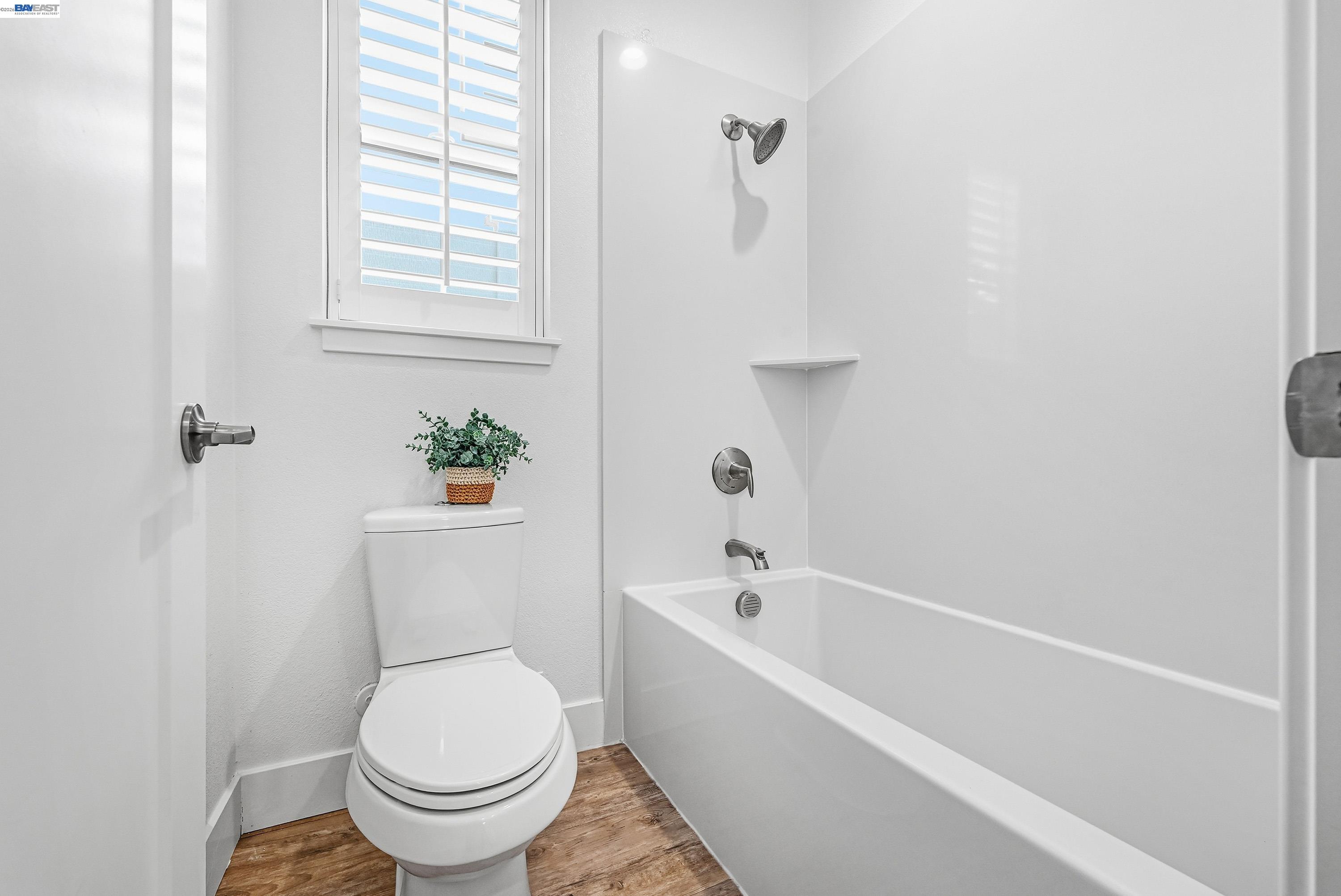 37541 Bay Crest Road Newark, CA 94560 - Photo 33 of 50 a white toilet sitting next to a bath tub