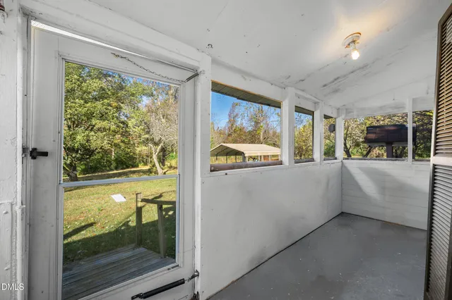 a view of a room and window