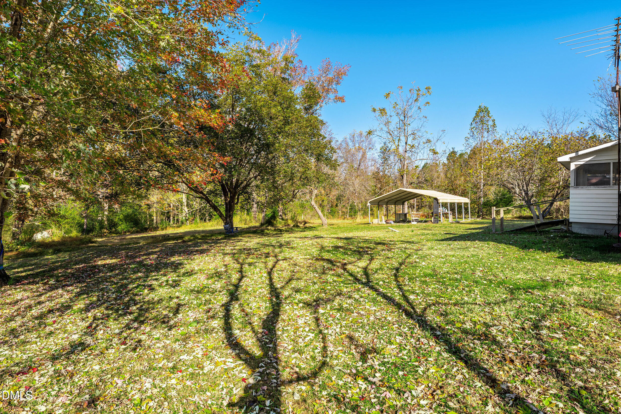 2707 Moorefields Road Hillsborough, NC 27278 - Photo 19 of 36 a view of yard with swimming pool and trees