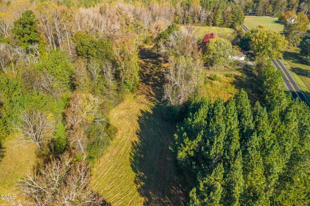 a view of swimming pool from a balcony
