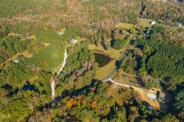 an aerial view of residential house with outdoor space